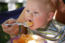 Toddler eating shave ice
